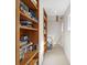 Hallway features a wall of built-in bookshelves, hardwood floors, and a staircase leading to the next level at 2217 Ramsay St, Charleston, SC 29412