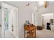 Bright hallway featuring exposed beams, a writing desk, and lots of storage space at 2217 Ramsay St, Charleston, SC 29412