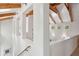 A bright, white hallway is detailed with wooden beams and leads to the main living space at 2217 Ramsay St, Charleston, SC 29412