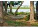 Hammock between two large trees in the yard, facing the water and marina at 2217 Ramsay St, Charleston, SC 29412