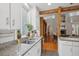 Bright kitchen featuring granite countertops, stainless sink, and open layout at 2217 Ramsay St, Charleston, SC 29412
