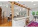 Open concept kitchen with granite island, stainless appliances, and view to the living area at 2217 Ramsay St, Charleston, SC 29412