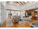Spacious living room featuring hardwood floors, ample seating, and an open layout connecting to the kitchen at 2217 Ramsay St, Charleston, SC 29412