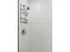 Modern shower features white tiled walls, an adjustable shower head, and a metal caddy for easy storage at 2217 Ramsay St, Charleston, SC 29412