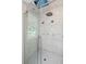 Modern glass shower with marble look tile and rain shower fixture at 2217 Ramsay St, Charleston, SC 29412