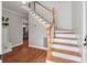 Bright entryway with wood floors, staircase, and decorative accents at 237 Dillard Dr, Goose Creek, SC 29445