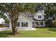 Charming two-story home with a welcoming front porch and beautiful lawn at 237 Dillard Dr, Goose Creek, SC 29445