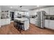 Modern kitchen with a large island, stainless steel appliances, and white cabinets at 237 Dillard Dr, Goose Creek, SC 29445