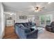 Spacious living room with a ceiling fan and view into the dining area at 237 Dillard Dr, Goose Creek, SC 29445