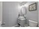 Charming powder room with a vessel sink, modern fixtures, and stylish gray paint and starfish decor at 237 Dillard Dr, Goose Creek, SC 29445