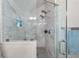 The luxury shower is tiled with marble, has dual shower heads and a glass door at 237 Dillard Dr, Goose Creek, SC 29445