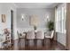 Inviting dining room with modern lighting, a stylish dining table, and a bar for entertaining at 2489 Daniel Island Dr, Daniel Island, SC 29492