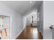 Spacious hallway with hardwood floors leading to bedroom at 2489 Daniel Island Dr, Daniel Island, SC 29492