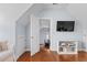 Comfortable sitting area featuring a mounted TV and hardwood floors at 2489 Daniel Island Dr, Daniel Island, SC 29492