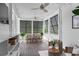 Inviting porch with a dining area, lounge seating and wooden floors at 2489 Daniel Island Dr, Daniel Island, SC 29492