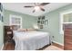 Comfortable bedroom with ample natural light, perfect for relaxation and rest with hardwood floors at 2631 Ridgewood Ave, Charleston, SC 29414