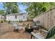 Charming backyard featuring a cozy fire pit area and comfortable seating arrangement at 2666 Poplin Ave, North Charleston, SC 29405