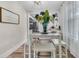 Bright dining area with decor, modern table set, and view to kitchen at 2666 Poplin Ave, North Charleston, SC 29405