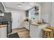 Well-appointed kitchen featuring butcher block counters, new stainless appliances, and ample storage space at 2666 Poplin Ave, North Charleston, SC 29405