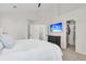 Large bedroom with a walk-in closet and a mounted television for entertainment at 2727 4 Winds Pl, Mount Pleasant, SC 29466