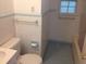 Bathroom featuring tiled walls and floors and white fixtures at 2734 Mona Ave, Charleston, SC 29414