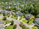 An aerial view of a lovely neighborhood with mature trees and meticulously maintained lawns at 2981 Sturbridge Rd, Mount Pleasant, SC 29466
