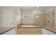 Luxurious bathroom featuring soaking tub, glass enclosed shower and neutral tile at 2981 Sturbridge Rd, Mount Pleasant, SC 29466