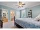 Comfortable bedroom features plush carpeting, en-suite bathroom and walk-in closet at 2981 Sturbridge Rd, Mount Pleasant, SC 29466