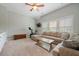 Spacious bonus room with plenty of natural light and comfortable seating at 2981 Sturbridge Rd, Mount Pleasant, SC 29466