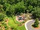 Aerial shot of a neighborhood playground surrounded by mature trees and lush green landscaping at 2981 Sturbridge Rd, Mount Pleasant, SC 29466