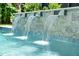 Swimming pool with stone waterfall feature at 2981 Sturbridge Rd, Mount Pleasant, SC 29466