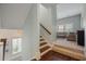 Staircase landing with hardwood and carpet flooring to separate living spaces at 2981 Sturbridge Rd, Mount Pleasant, SC 29466