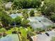 Overhead view of multiple tennis courts and picturesque landscaping creates an inviting recreational space at 2981 Sturbridge Rd, Mount Pleasant, SC 29466