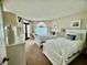 Bright bedroom features two beds with ocean view and sliding glass doors at 311 Seascape (Share G), Isle of Palms, SC 29451