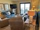 Living room featuring comfortable sofas and chairs, flat screen TV, and ocean view at 311 Seascape (Share G), Isle of Palms, SC 29451
