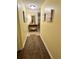 Inviting hallway with beach decor and carpet runner enhancing the interior design at 311 Seascape (Share H), Isle of Palms, SC 29451