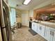 Well-equipped kitchen with granite countertops and white cabinets, providing a functional and stylish cooking space at 311 Seascape (Share H), Isle of Palms, SC 29451