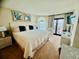 Serene main bedroom with a king bed and ocean views, creating a relaxing retreat at 311 Seascape (Share H), Isle of Palms, SC 29451