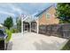 View of a backyard patio with pergola, green space, a privacy fence and a barbecue at 3807 Canary Ct, North Charleston, SC 29420