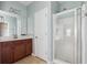 Bathroom showcasing vanity with sink, shower with glass door, and neutral color scheme at 3807 Canary Ct, North Charleston, SC 29420