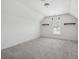 A bedroom featuring neutral walls, carpeted floors, with a window, baseboards and shelving at 3807 Canary Ct, North Charleston, SC 29420