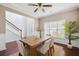 The dining area includes a wooden table and a large window, all set within a neutrally decorated space at 3807 Canary Ct, North Charleston, SC 29420