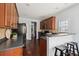 Functional kitchen features dark countertops, modern appliances, and ample storage space at 3807 Canary Ct, North Charleston, SC 29420