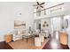 This living room has a fireplace, a loft, nice seating, and lots of natural light at 3807 Canary Ct, North Charleston, SC 29420