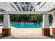 Community swimming pool with pergolas offers relaxation and enjoyment at 3807 Canary Ct, North Charleston, SC 29420
