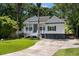 Charming home featuring a welcoming front porch, white columns, and a well-manicured lawn at 3872 James Bay Road, Johns Island, SC 29455