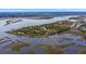 Expansive waterfront property with lush greenery; a nature-lover's dream with serene water views at 401 Felders Ln, Johns Island, SC 29455