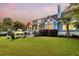 Inviting backyard with a cozy firepit area and outdoor seating, perfect for entertaining at 401 Felders Ln, Johns Island, SC 29455