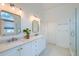 Bright bathroom featuring double vanity, modern fixtures, and a glass-enclosed shower at 401 Felders Ln, Johns Island, SC 29455
