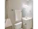 Well-lit bathroom with a shower, towel rack, and vanity with storage at 401 Felders Ln, Johns Island, SC 29455